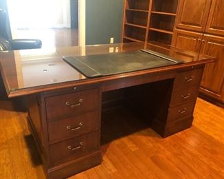 Great desk for your executive!  IN excellent condition, no scratches, glass top