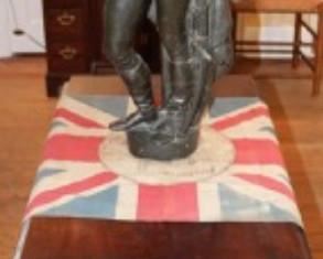 Im not sure who that is standing on a Canadian flag