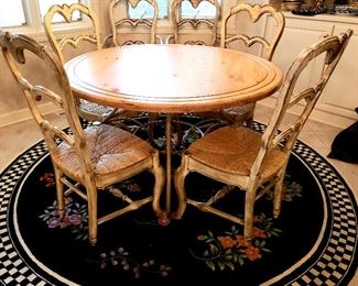 5' round table, six rush bottom chairs including two host's & attractive round rug