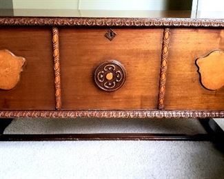 Vintage cedar chest has key