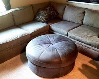 Three piece sectional & round leather ottoman