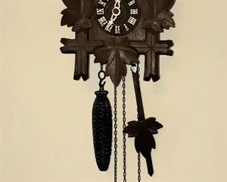 Cuckoo clock with on time bird