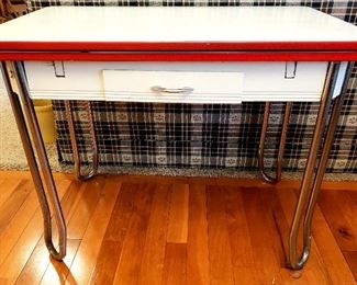 Porcelain top vintage table with chrome legs