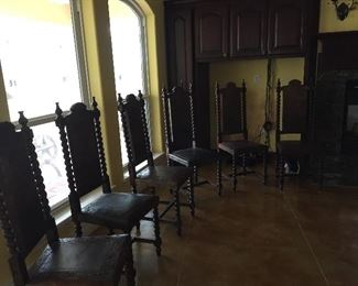 Peruvian Barley Twist Dining/Side Chairs.  Each Chair is Uniquely Carved in Front as well as in Back.  Each Depicting a Different Story.  There are Six of these Items.