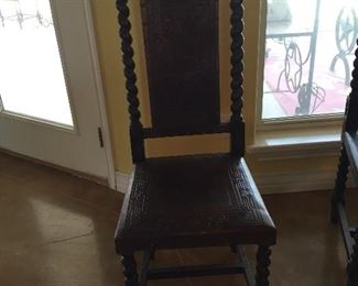 Peruvian Barley Twist Dining/Side Chairs.  Each Chair is Uniquely Carved in Front as well as in Back.  Each Depicting a Different Story.  There are Six of these Items.