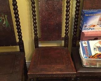Peruvian Barley Twist Dining/Side Chairs.  Each Chair is Uniquely Carved in Front as well as in Back.  Each Depicting a Different Story.  There are Six of these Items.
