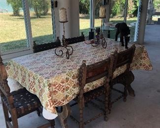 Originated from Spain Dining Table Heavy Wood Chairs are Woven Leather Seats Six, Wrought Iron Candlesticks