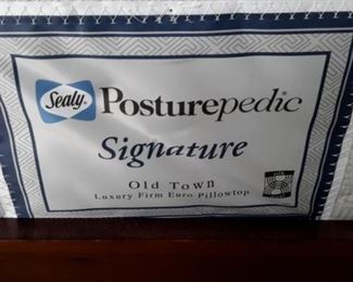 King Size Sealy Posturepedic Signature Pillow top Mattress and Box Springs! Very Clean. Kingsize four post head and foot board with side rails!