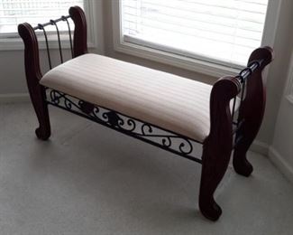 Ornate wood and metal upholsted bench