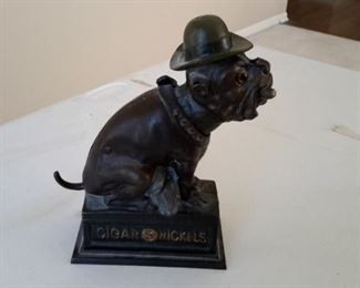 Vintage cast iron "Ole Puffer" 5 cent cigar bank. Works.