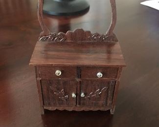 a large assortment of antique doll house furniture