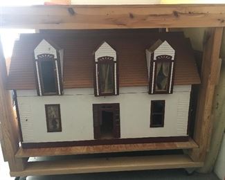This is a custom built antique dollhouse, this was built in 1903, is is the exact replica of the home the Grandmother lived in