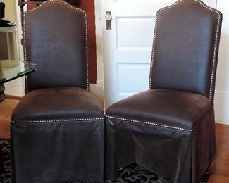 PAIR OF LEATHER UPHOLSTERED PARSONS CHAIRS WITH STUDS