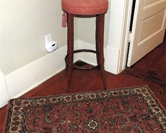 RUG AND UPHOLSTERED STOOL