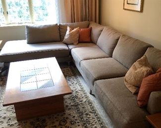 Quality brushed aluminum legged sectional super clean