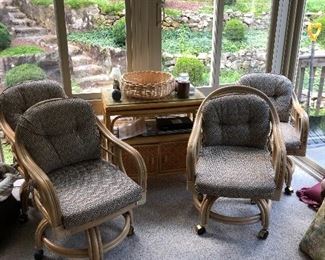 4 bamboo chairs on wheels 