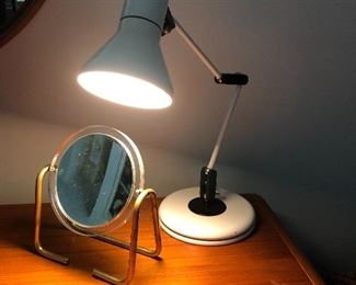 Modern lamp and mirror with brass supports