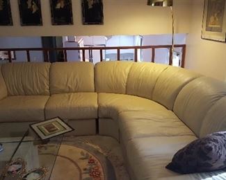 Off white leather sofa.  Three sections