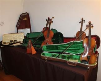 Vintage violins, some with issues