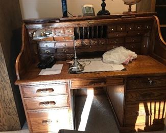 Solid oak roll top desk, excellent condition.