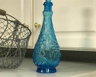 Blue decanter and large wire basket