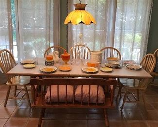 Bamboo table, bentwood back chairs, and bench