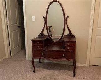 Beautiful Vanity with Glass knobs and tilting mirror. 