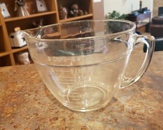 Pyrex Measuring Bowl. For those of you that measure. The last thing I measured was....well, fill in the blank. But I can cook. Ask me about it and I will have you over for dinner. Unless you're a freak.