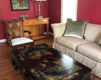 Designer Couch, Asian coffee table, sideboard, framed artwork, brushed gold lamp 