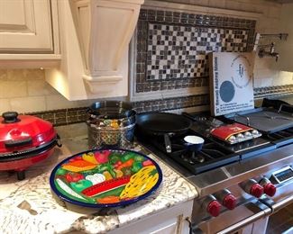 Pizza maker and stones, platters and stainless pots and pans