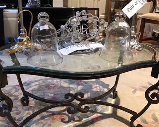 Cloches. Glass top and Wrought iron. Crystal chandelier. Oriental rug.