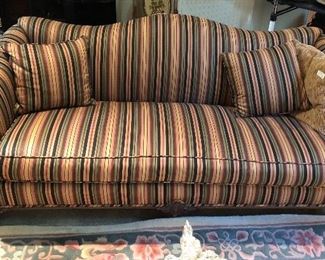 This picture does not do this sofa justice. Hump backed Chippendale legs. Beautifully upholstered. and two pillows.