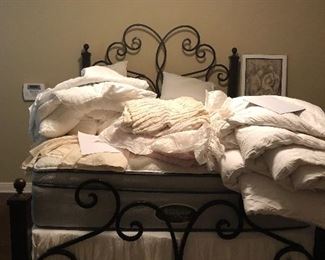 Double bed and bedding. Buy the bed and get the mattress free.
