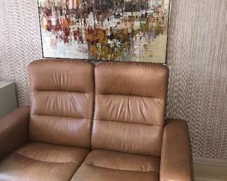 double leather recliner and framed acrylic