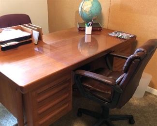 Teak desk by Povl Dinesen with bookcase feature on backside, leather office chair and accessories