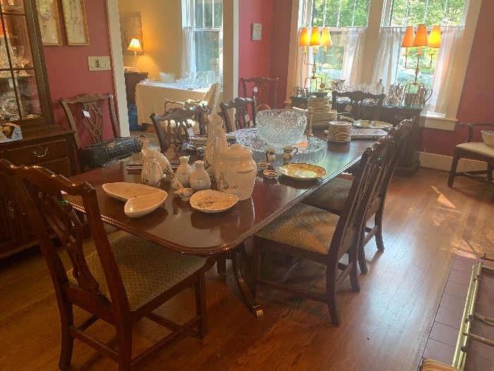 Knob Creek cherry dining table with two leaves and 4 pads, 8 side chairs and 2 arm chairs