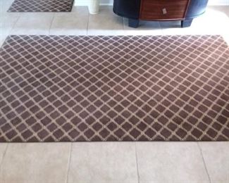 two matching area rugs