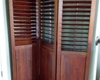 Room divider with shutters