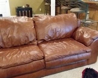 Matching Leather sofa and chair great condition barely used!