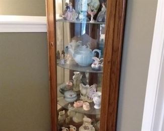 Lighted solid oak curved glass corner curio with lock and key (not all contents for sale).