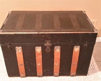 Vintage trunk with smokey glass top.