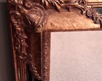 Large framed mirror.