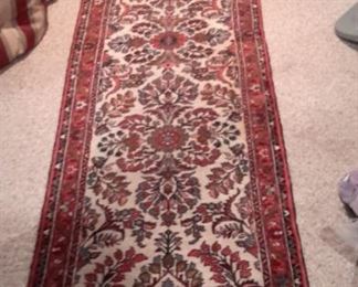 Hand knotted wool runner in great condition. There are two of these, slightly different color and patterns.