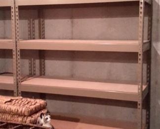 THREE metal shelves in like new condition!