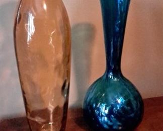 Two hand blown glass vases.