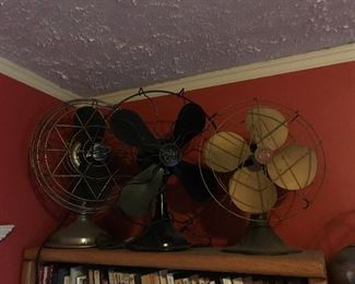 several antique fans in working condition