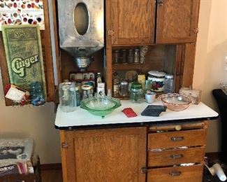 Hoosier-style antique kitchen cabinet with original flour sifter