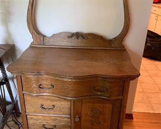 Antique wash stand with towel bar