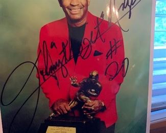 Autographed Johnny Rodgers photograph with Heisman trophy