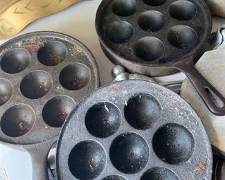 Cast iron pans, some signed